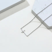 Silver cross necklace on a chain from Fresh Faith Designs women's faith jewelry collection