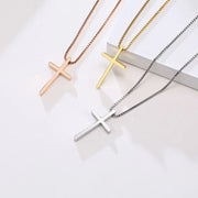 Women's faith jewelry featuring three cross necklaces in rose gold, gold, and silver finishes