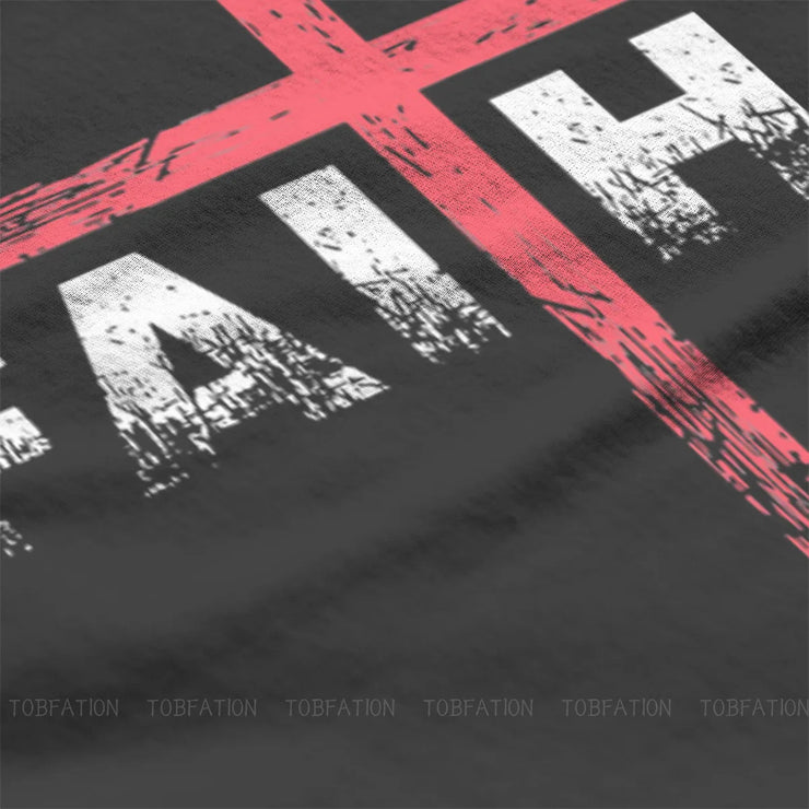 Close-up of vintage faith cross tee black shirt with distressed white text and a red cross design