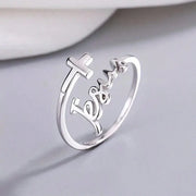 Silver women's Christian rings featuring a cross and Jesus script design by Fresh Faith Designs