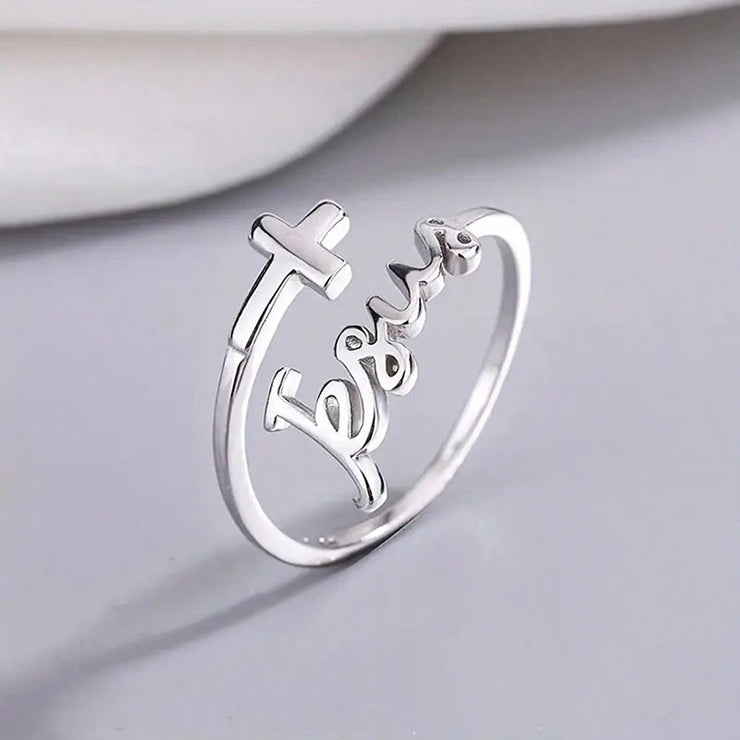 Silver women's Christian rings featuring a cross and Jesus script design by Fresh Faith Designs