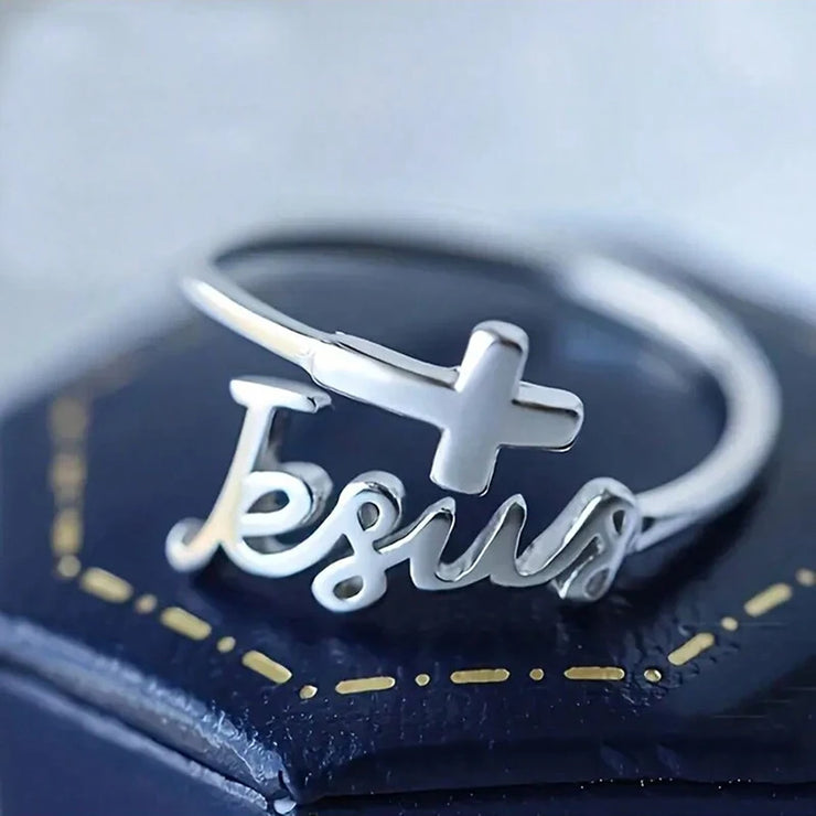 Silver women's Christian rings featuring Jesus script and cross design from Fresh Faith Designs