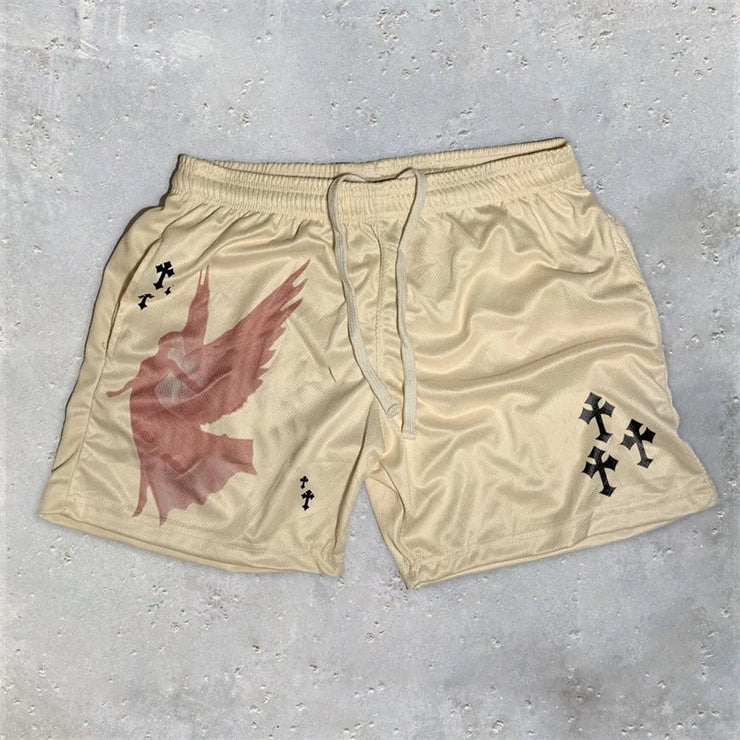 Fresh Faith Designs beige Y2K Christian gym shorts with angel graphic and cross symbols