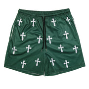 Fresh Faith Designs green Y2K Christian gym shorts with white cross patterns and black drawstring