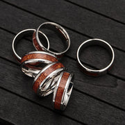 Men's Christian jewelry wooden inlay silver rings by Fresh Faith Designs on dark wood surface